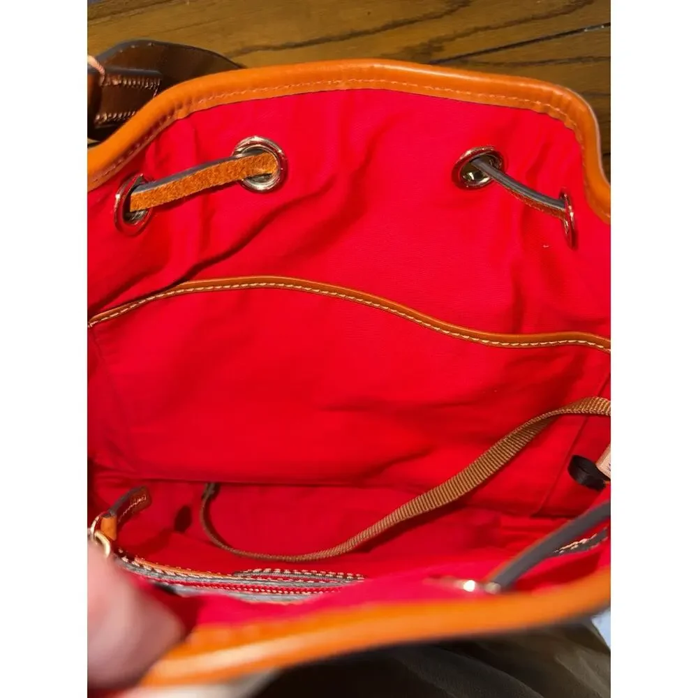 Dooney & Bourke Pebble Grain Drawstring Bucket Bag Blue Leather Red Interior